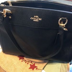 Black and gold coach